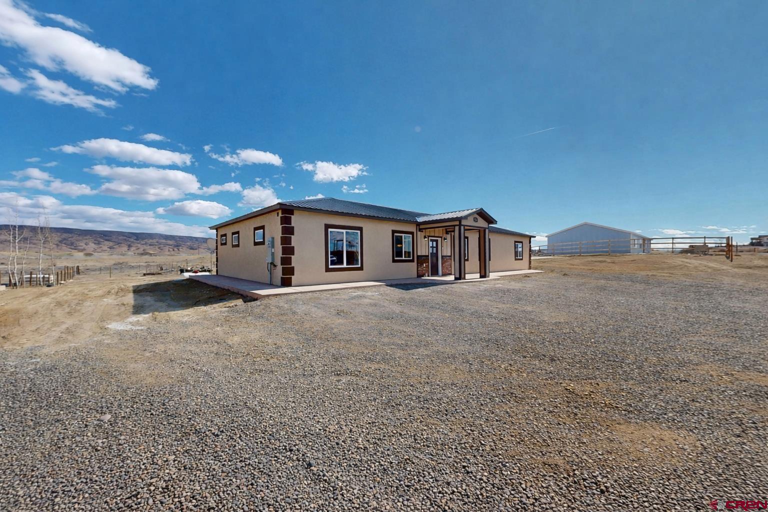 3728 Ruth Lane Delta, CO 81416 - Photo 29 of 34 a house view with a backyard space