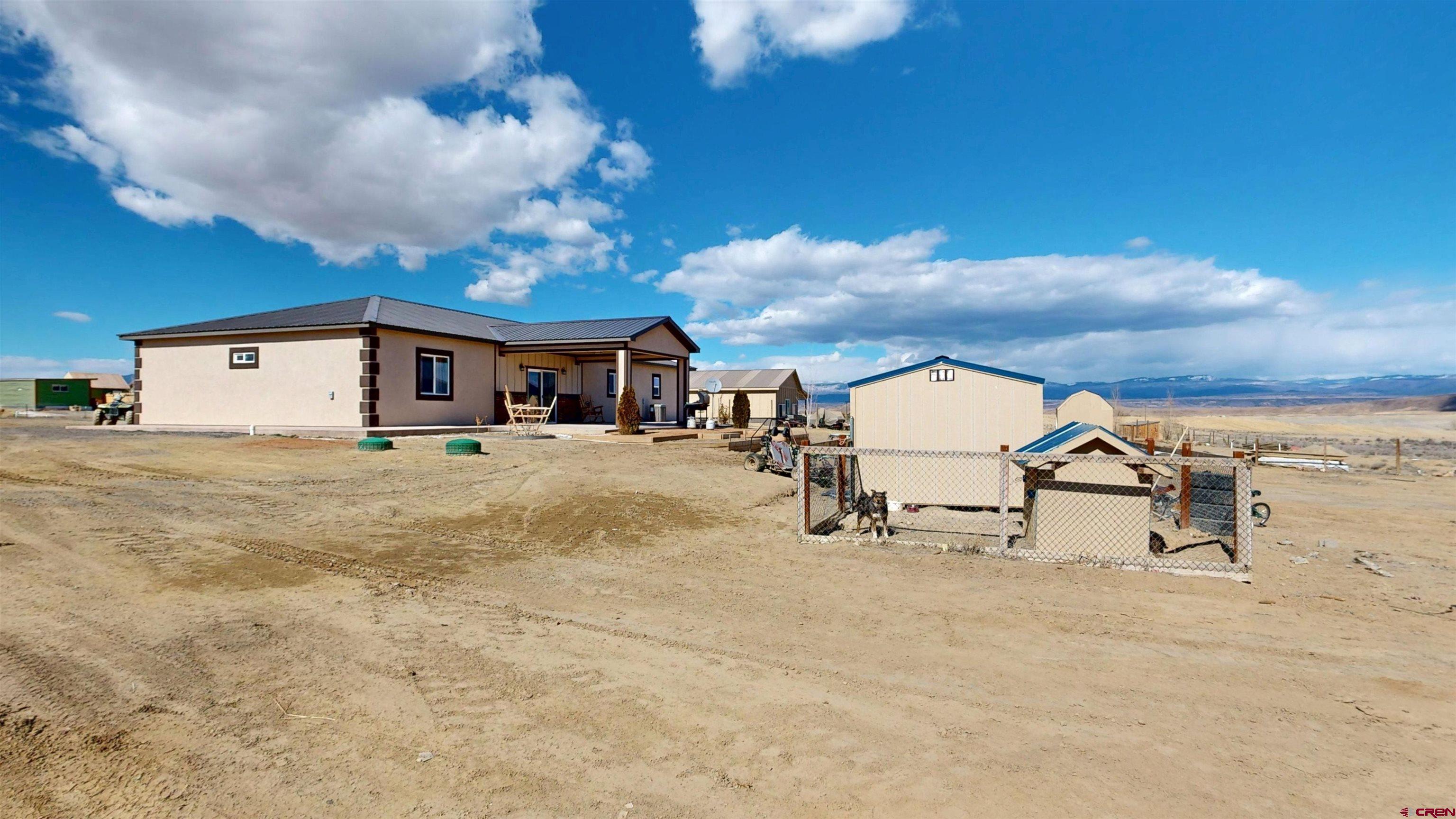 3728 Ruth Lane Delta, CO 81416 - Photo 32 of 34 a big room with table and chairs