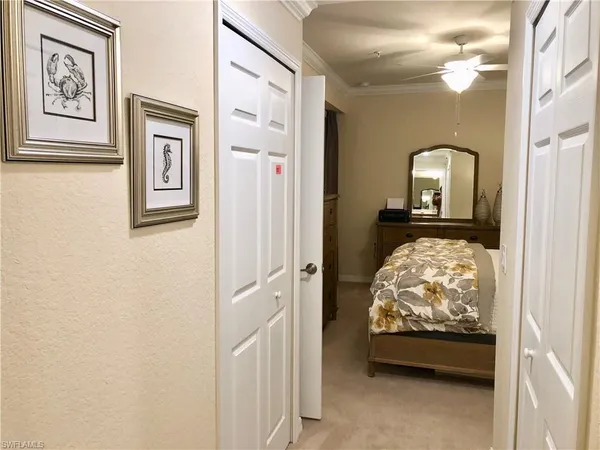 a view of bedroom with bed and furniture