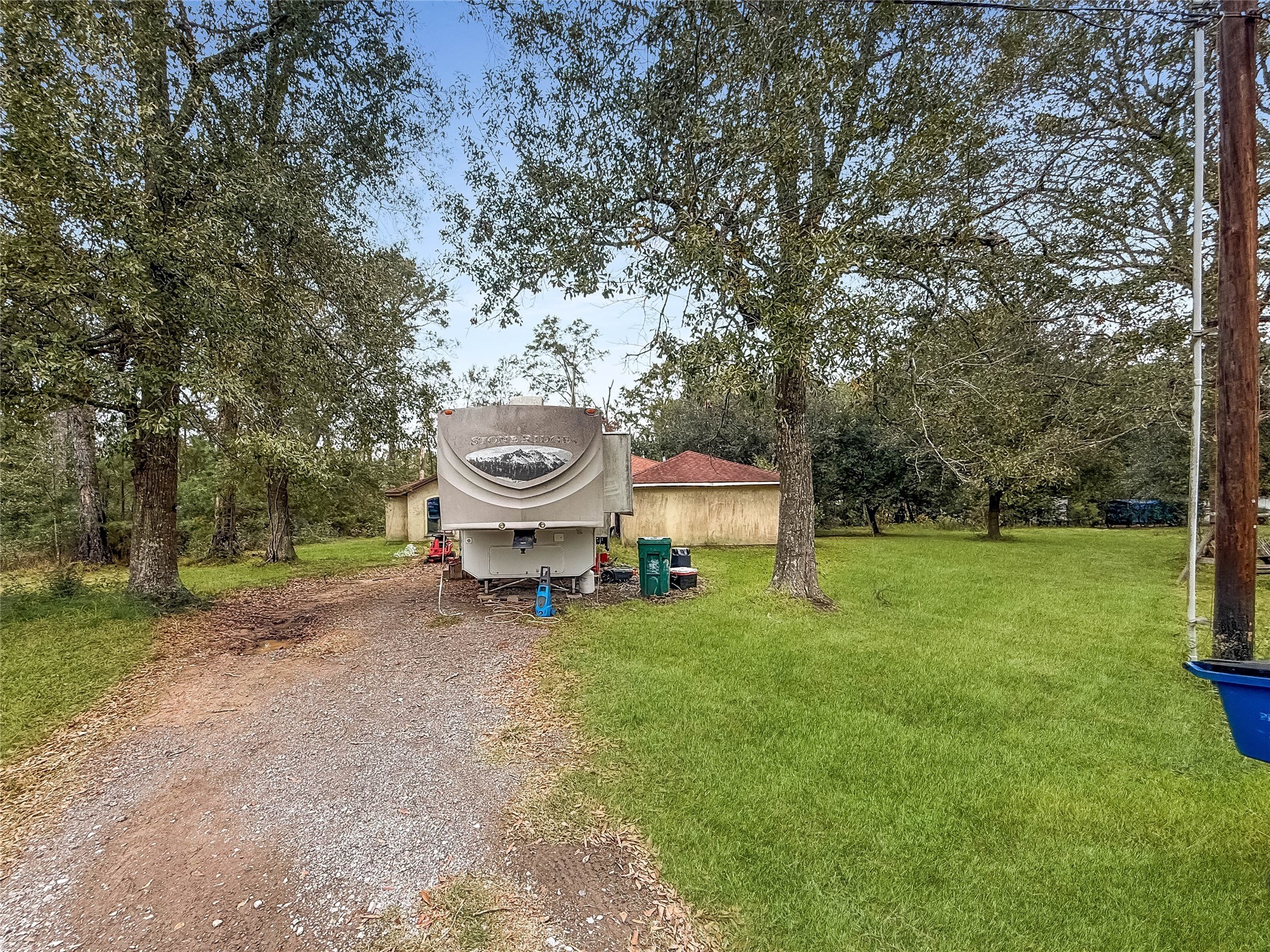 4585 Eaves Road Vidor, TX 77662 - Photo 7 of 7 a backyard of a house with table and chairs