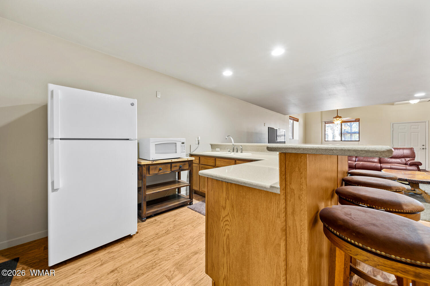 2940 Constellation Lane Overgaard, AZ 85933 - Photo 36 of 86 Bar with fridge and sink