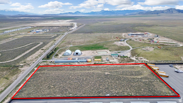 727 South Allens Rnch Road, Unit 8 Fairfield, UT 84013 - Photo 1 of 16 Aerial view of sparsely populated area featuring property boundaries highlighted and a mountainous background