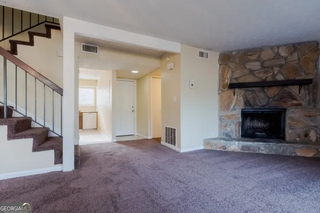 a view of a livingroom with a fireplace