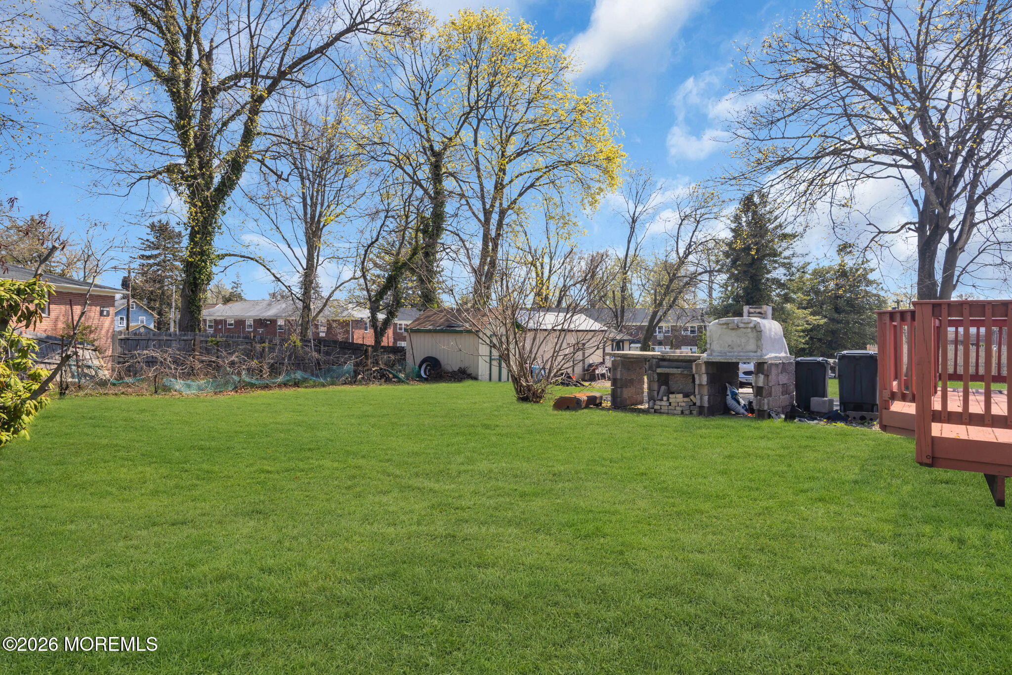 23 Spring Street Freehold, NJ 07728 - Photo 23 of 31 a view of a house with backyard and garden