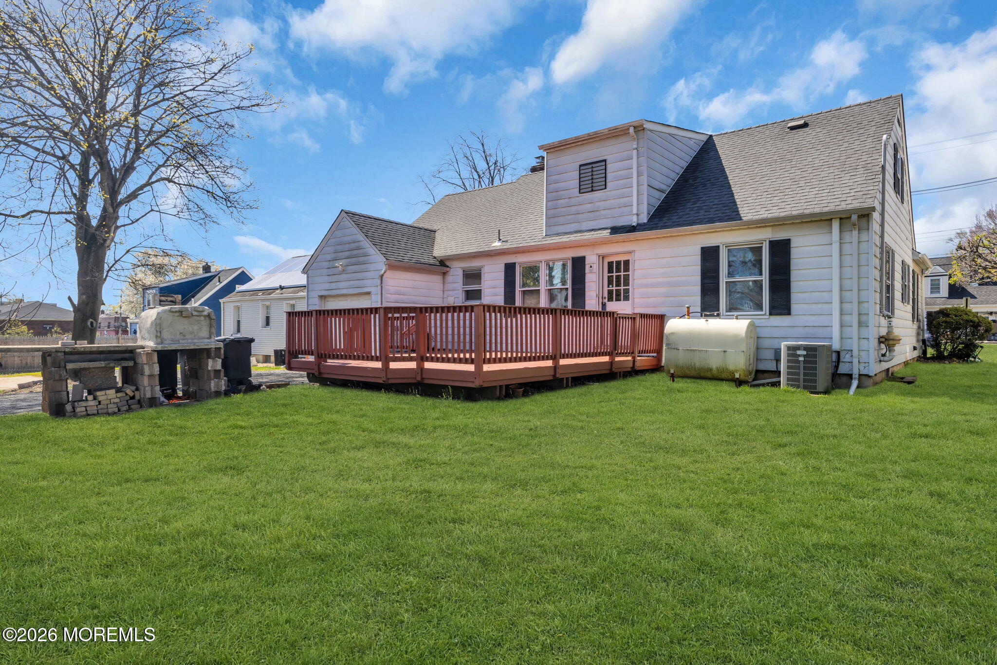 23 Spring Street Freehold, NJ 07728 - Photo 25 of 31 a front view of a house with garden