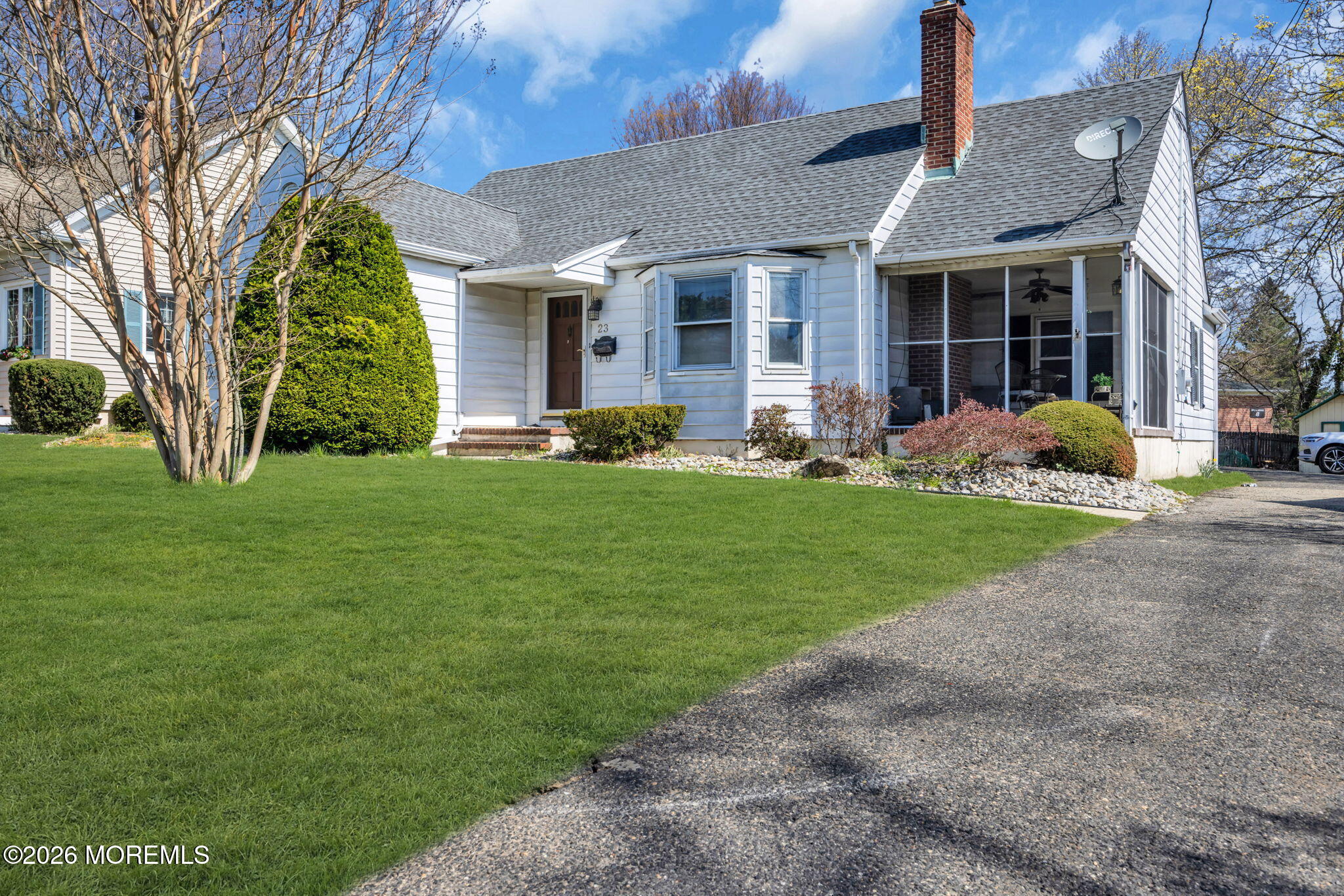 23 Spring Street Freehold, NJ 07728 - Photo 30 of 31 a front view of a house with a yard and porch