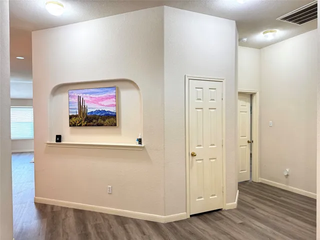 a view of a livingroom with wooden floor