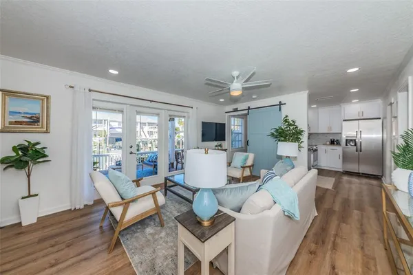 a living room with furniture and a table