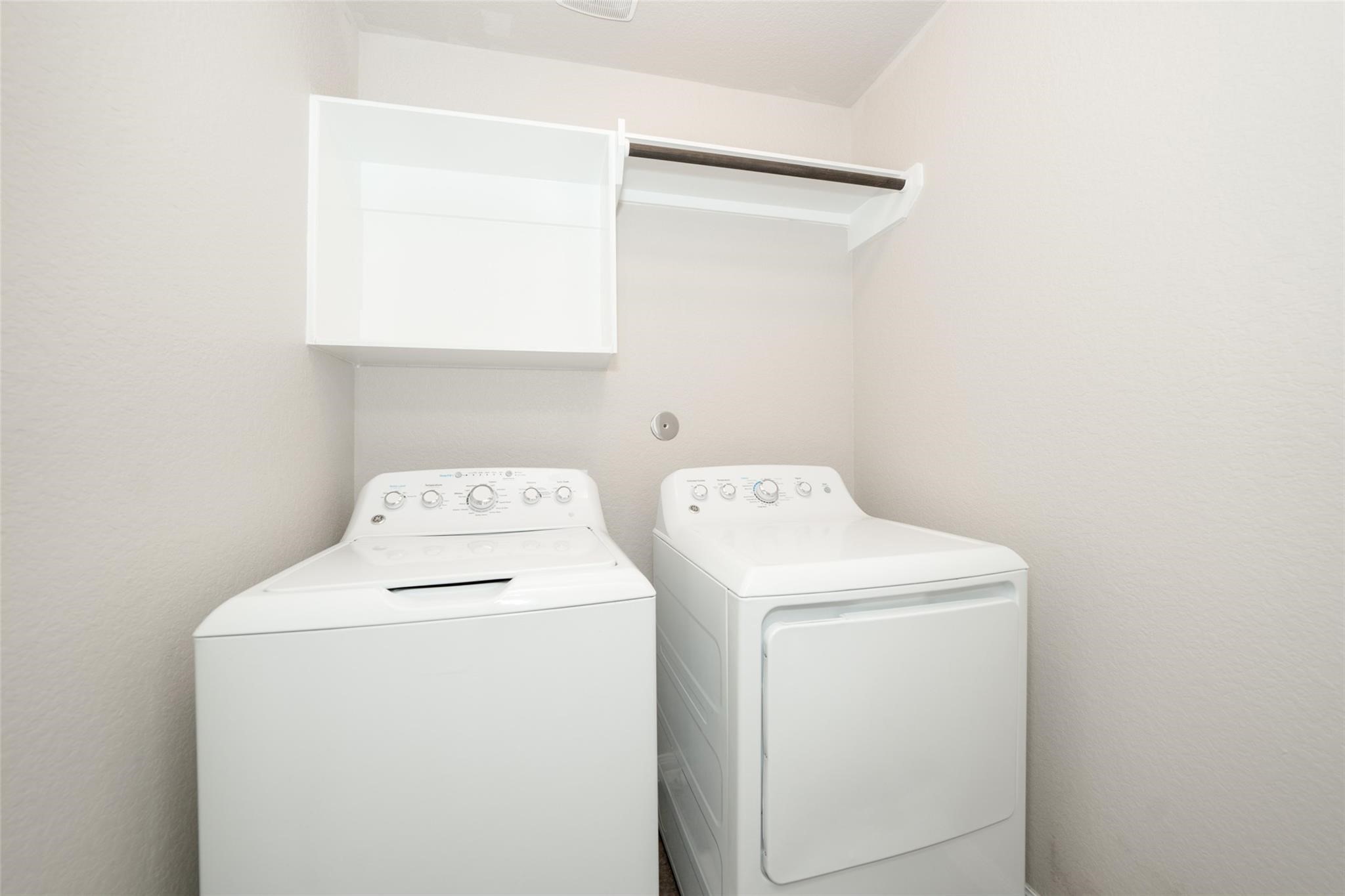 18834 Lansdowne Stream Path Katy, TX 77449 - Photo 17 of 21 a utility room with dryer and washer