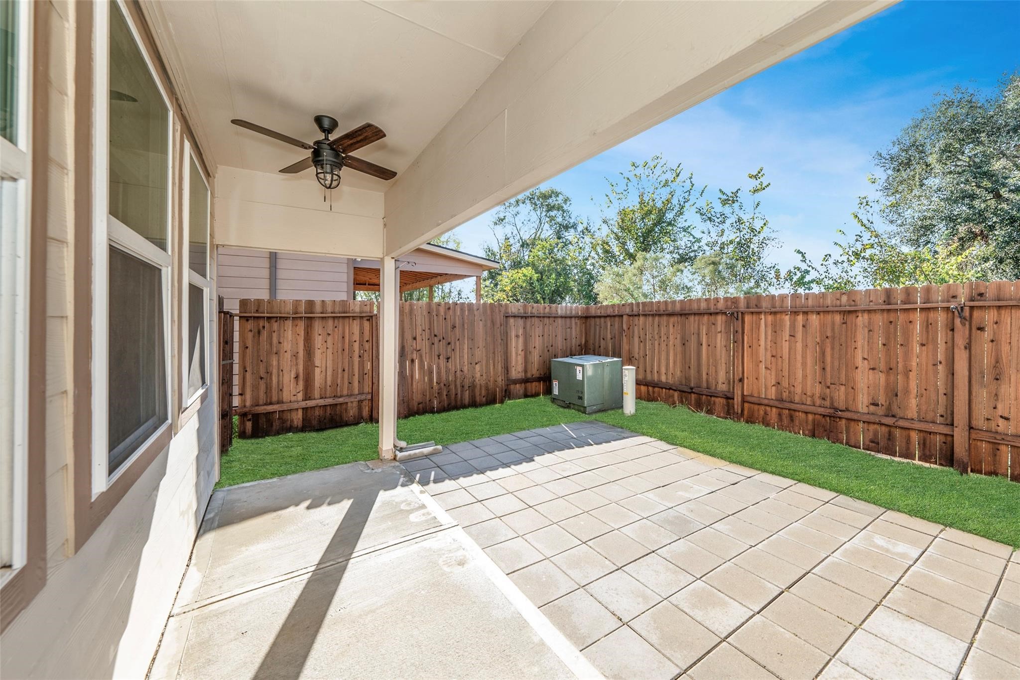 18834 Lansdowne Stream Path Katy, TX 77449 - Photo 18 of 21 a view of a backyard with wooden fence