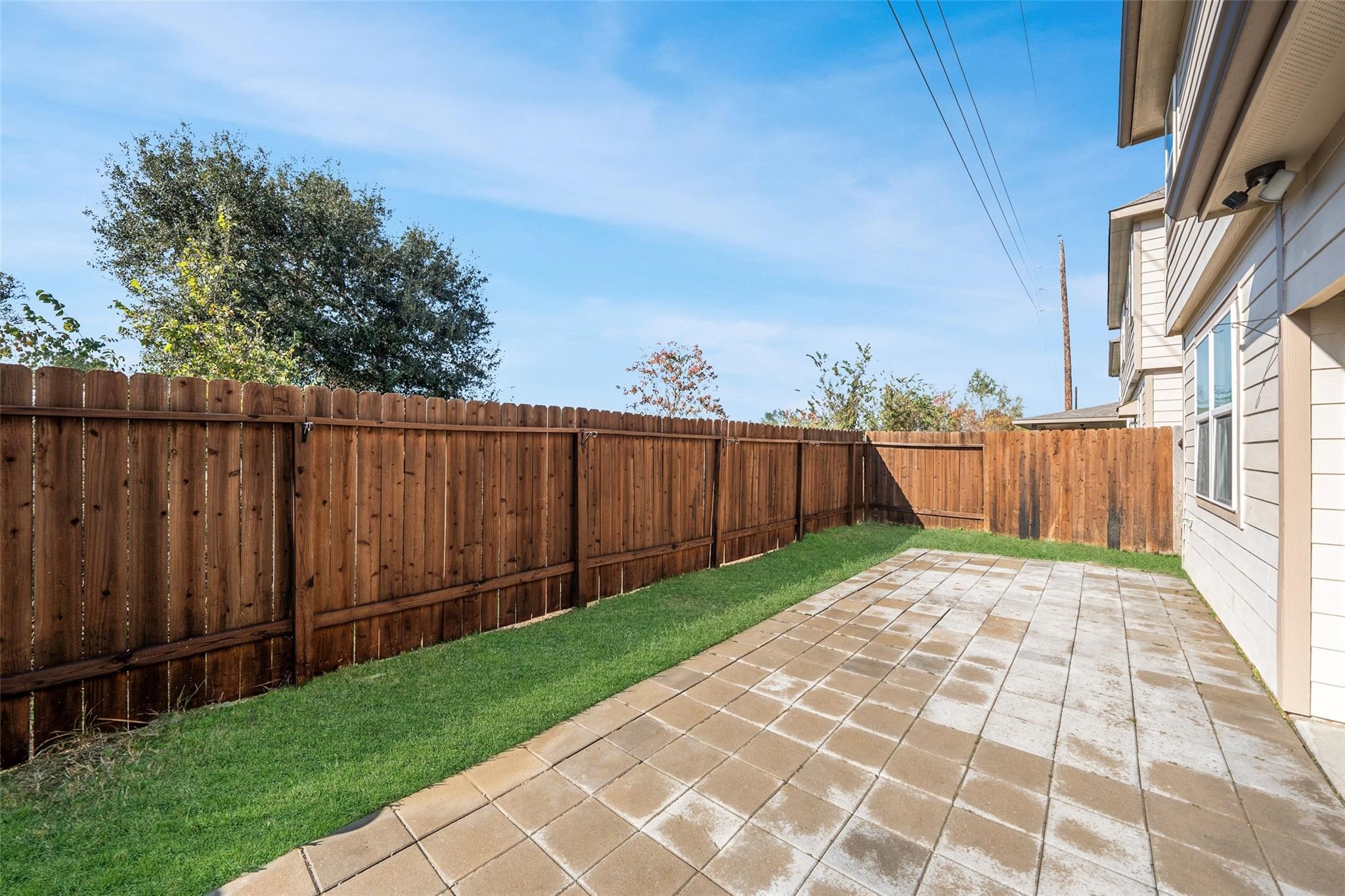 18834 Lansdowne Stream Path Katy, TX 77449 - Photo 19 of 21 a view of a backyard with wooden fence