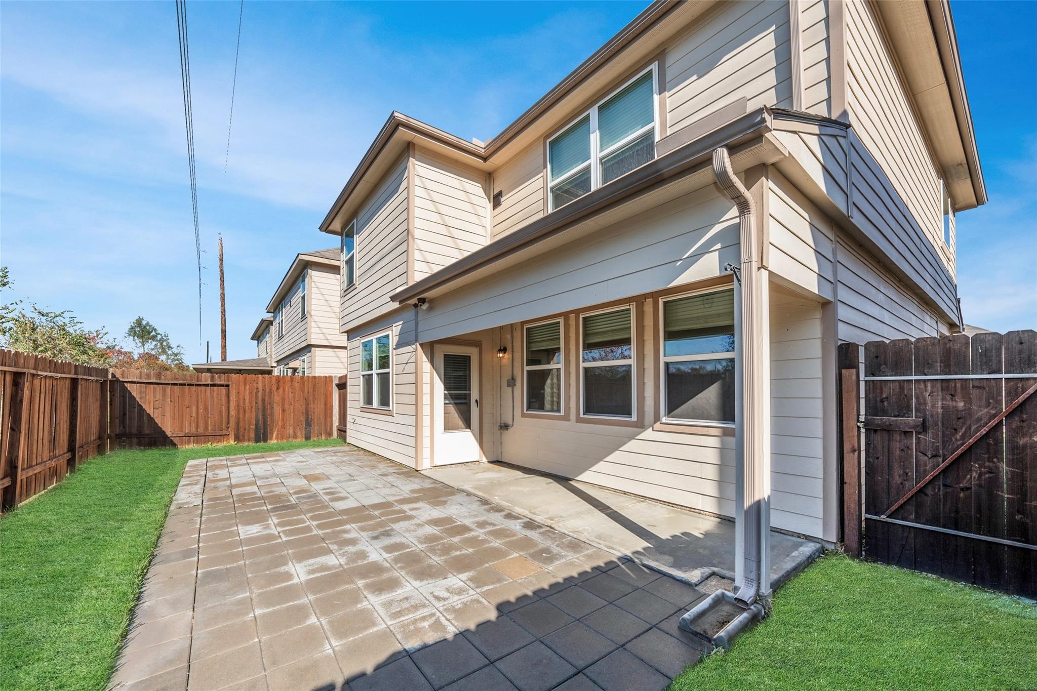18834 Lansdowne Stream Path Katy, TX 77449 - Photo 21 of 21 a view of a house with a yard and wooden fence