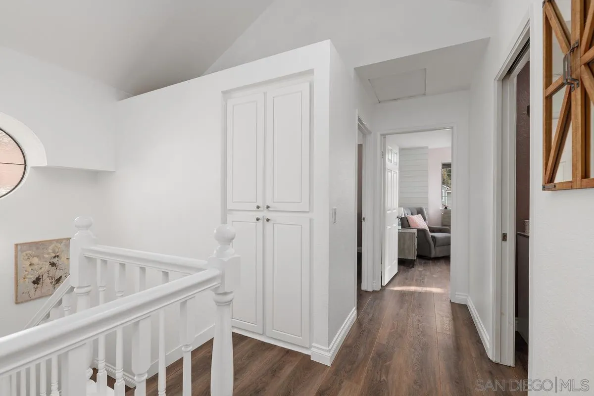 14680 Carmel Ridge Road San Diego, CA 92128 - Photo 24 of 33 a view of a bedroom from a hallway