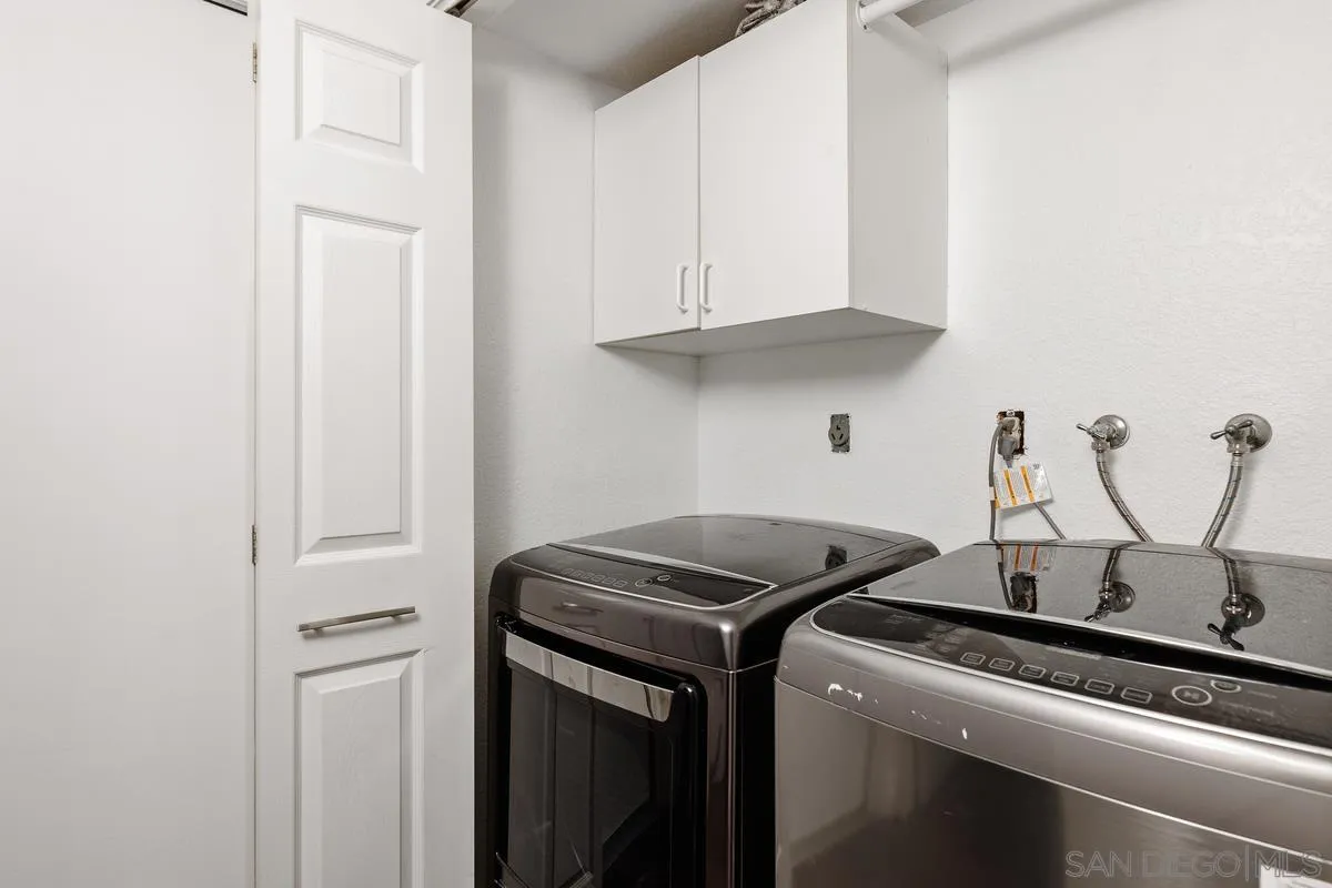 14680 Carmel Ridge Road San Diego, CA 92128 - Photo 28 of 33 a kitchen with a stove and a sink