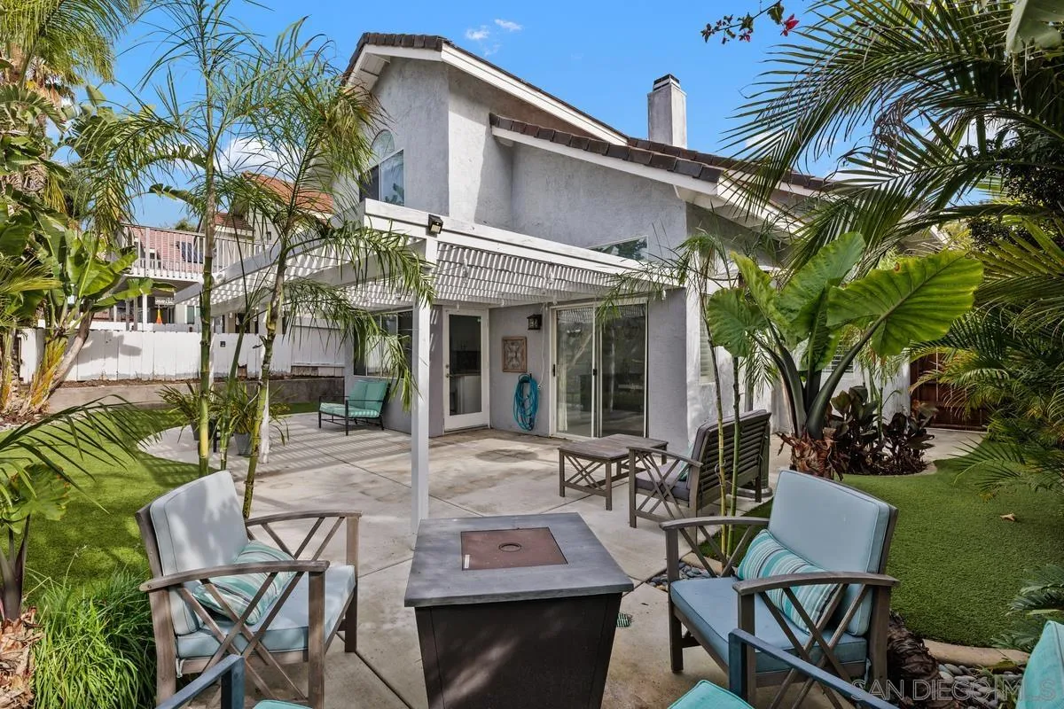 14680 Carmel Ridge Road San Diego, CA 92128 - Photo 32 of 33 a view of a patio with table and chairs and potted plants
