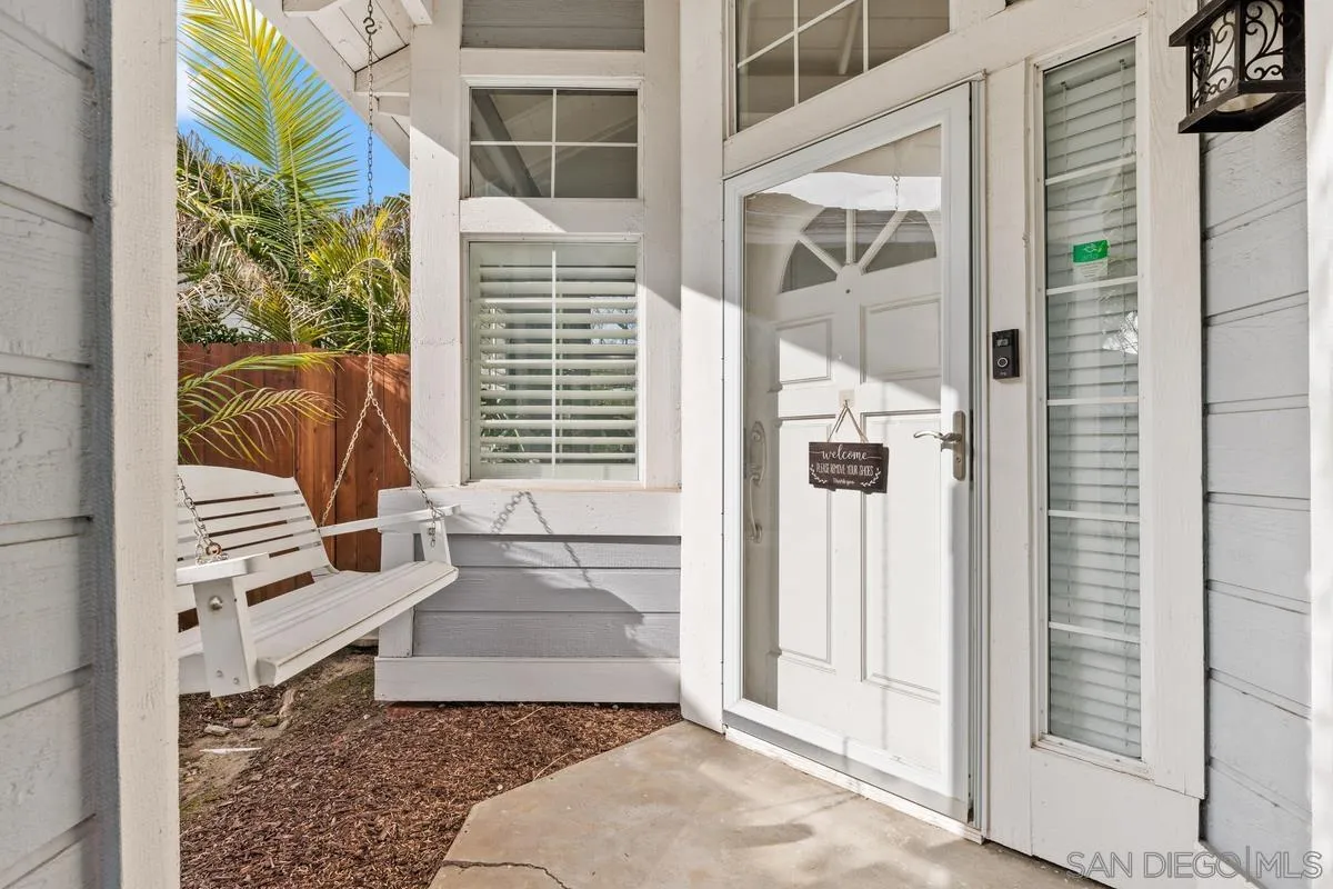 14680 Carmel Ridge Road San Diego, CA 92128 - Photo 5 of 33 a view of wooden door and a window