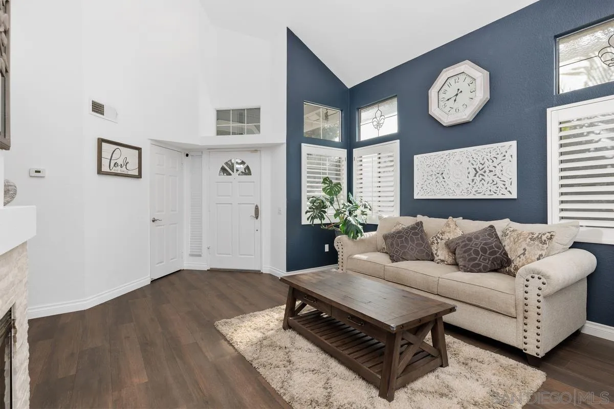 14680 Carmel Ridge Road San Diego, CA 92128 - Photo 7 of 33 a living room with furniture and a window