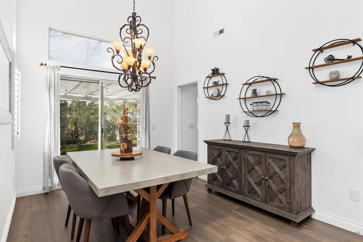 14680 Carmel Ridge Road San Diego, CA 92128 - Photo 10 of 33 a view of a dining room with furniture window and outside view