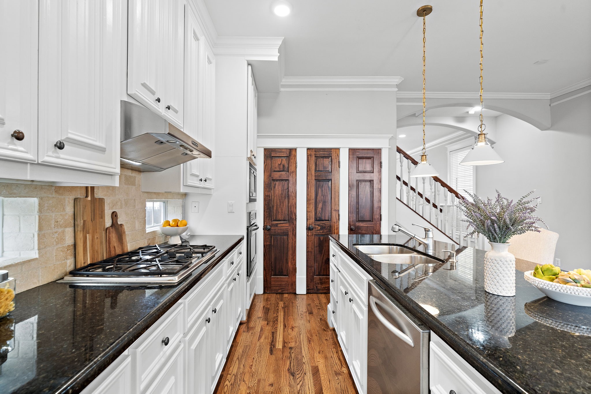 809 West 20th Street Houston, TX 77008 - Photo 18 of 39 a kitchen with stainless steel appliances granite countertop a sink stove and refrigerator