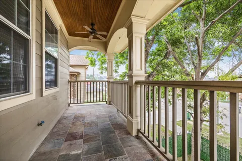 a view of a porch with wooden floor and outdoor space