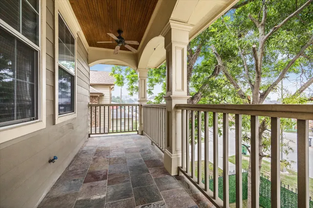a view of a porch with wooden floor and outdoor space