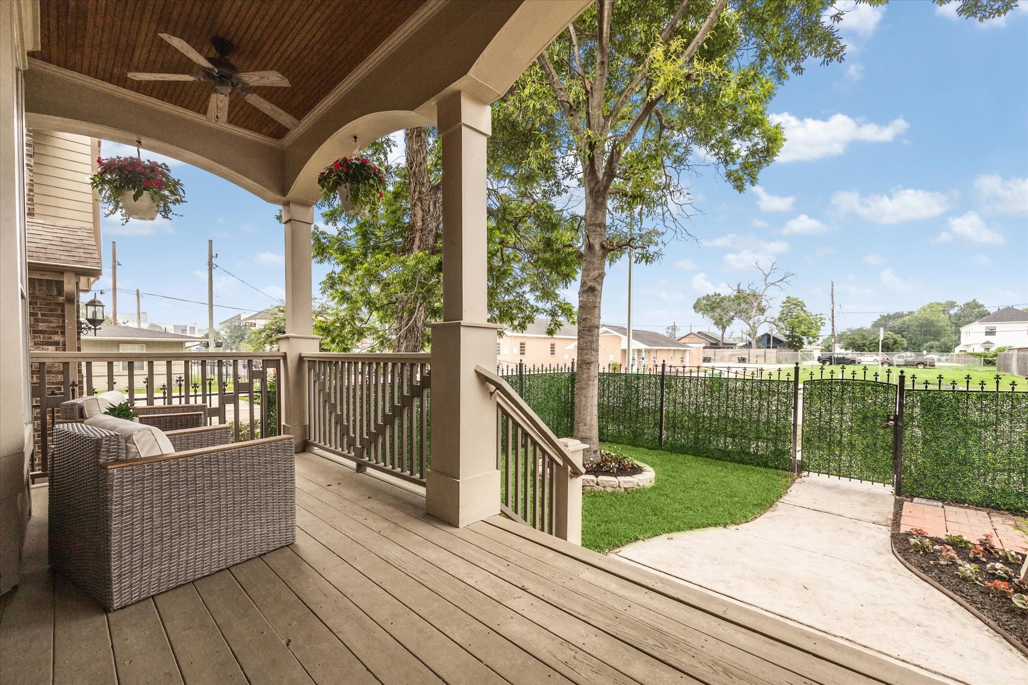 809 West 20th Street Houston, TX 77008 - Photo 6 of 39 a view of a deck with couches and wooden floor with a yard