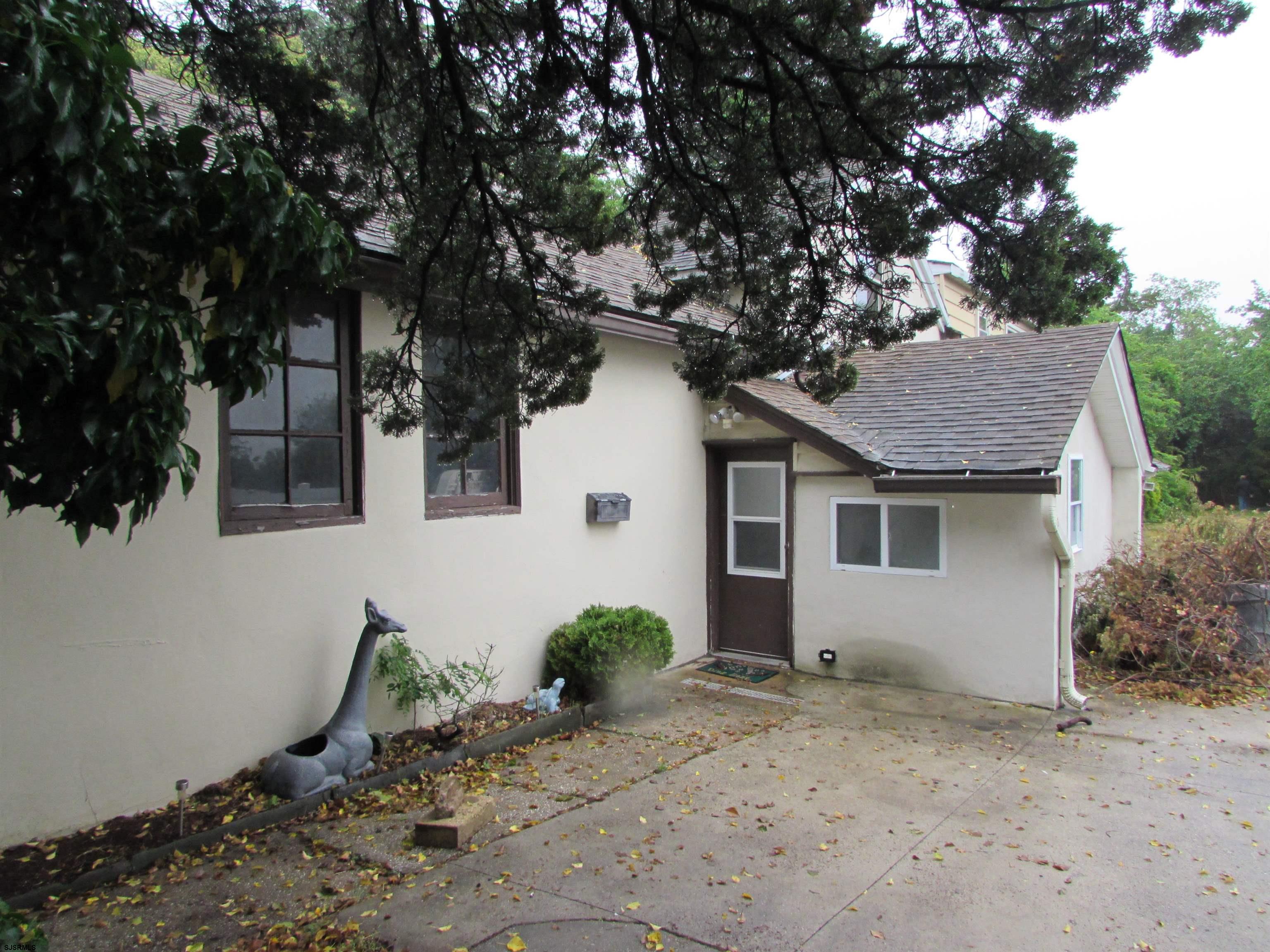 744 Shore Road Linwood, NJ 08221 - Photo 43 of 43 a view of a house with a tree in the background