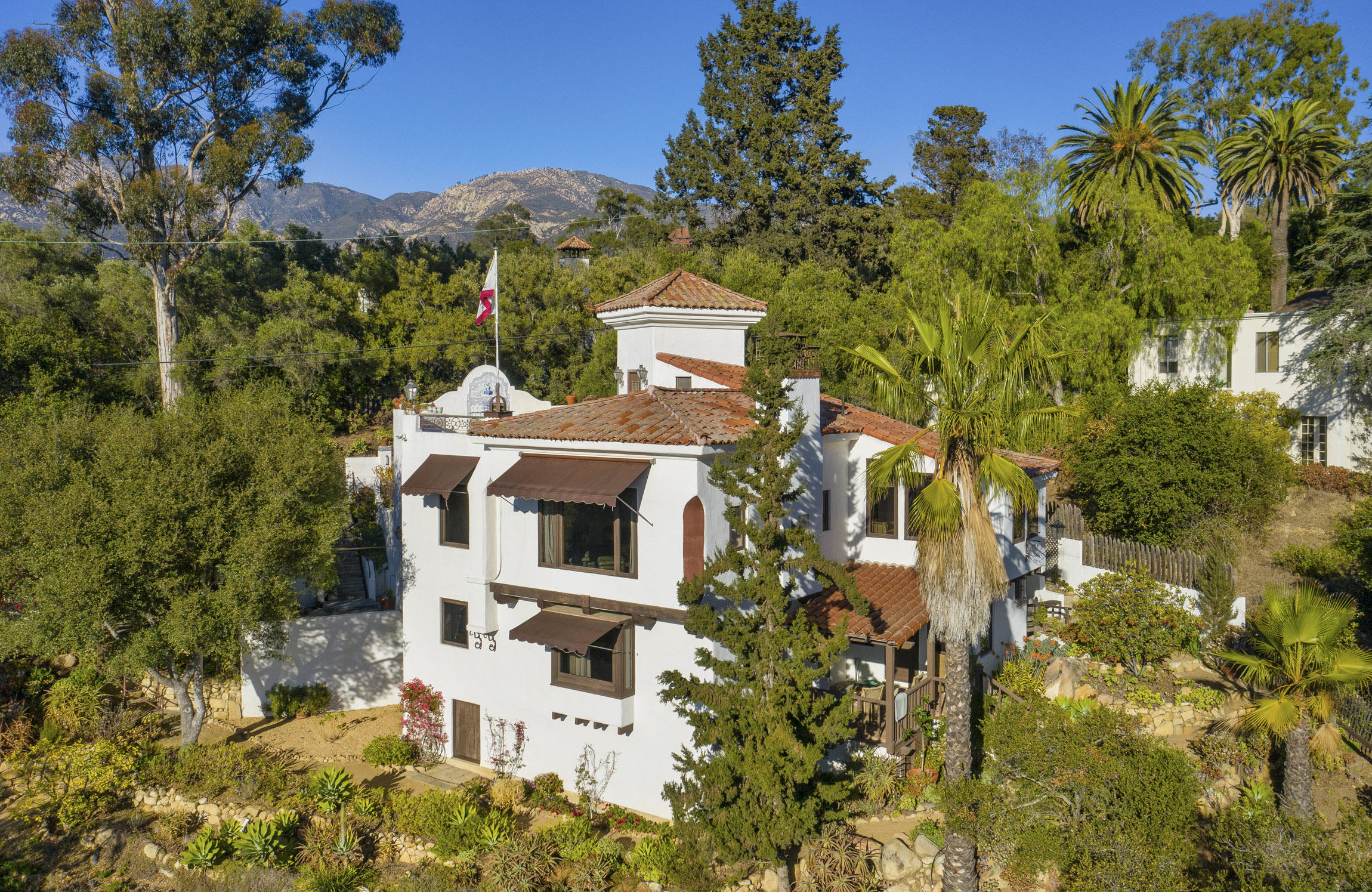 2217 Mission Ridge Road Santa Barbara, CA 93103 - Photo 7 of 57 a view of a house with a yard