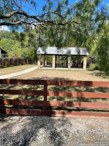 a view of a yard with an outdoor space
