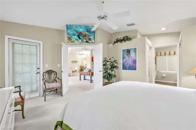 a bedroom with furniture and a window