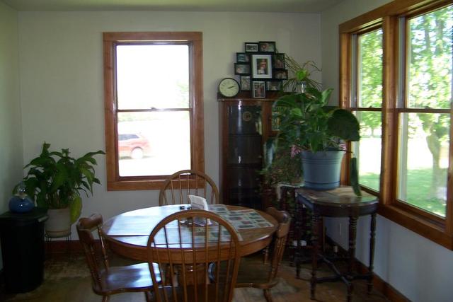 4265 North 3350 E Road Chatsworth, IL 60921 - Photo 6 of 22 a view of a dining room with furniture window and outside view