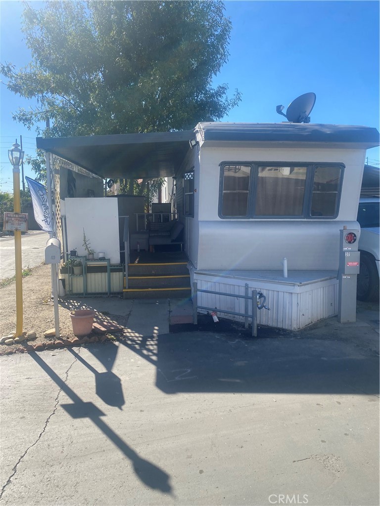 Front View with view of side patio area