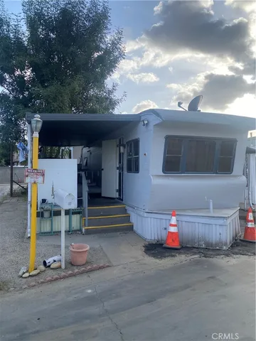 a front view of a house with a garage