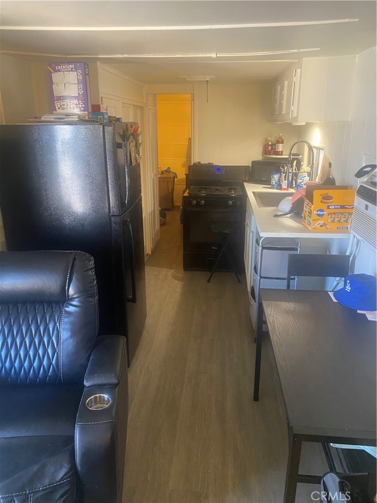 4849 Peck Road, Unit 37 El Monte, CA 91732 - Photo 7 of 10 Long hall way from living room area to rear of the home.