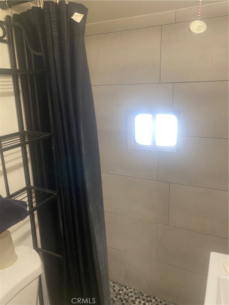 4849 Peck Road, Unit 37 El Monte, CA 91732 - Photo 10 of 10 Shower adjacent to plenty of cabinet space.