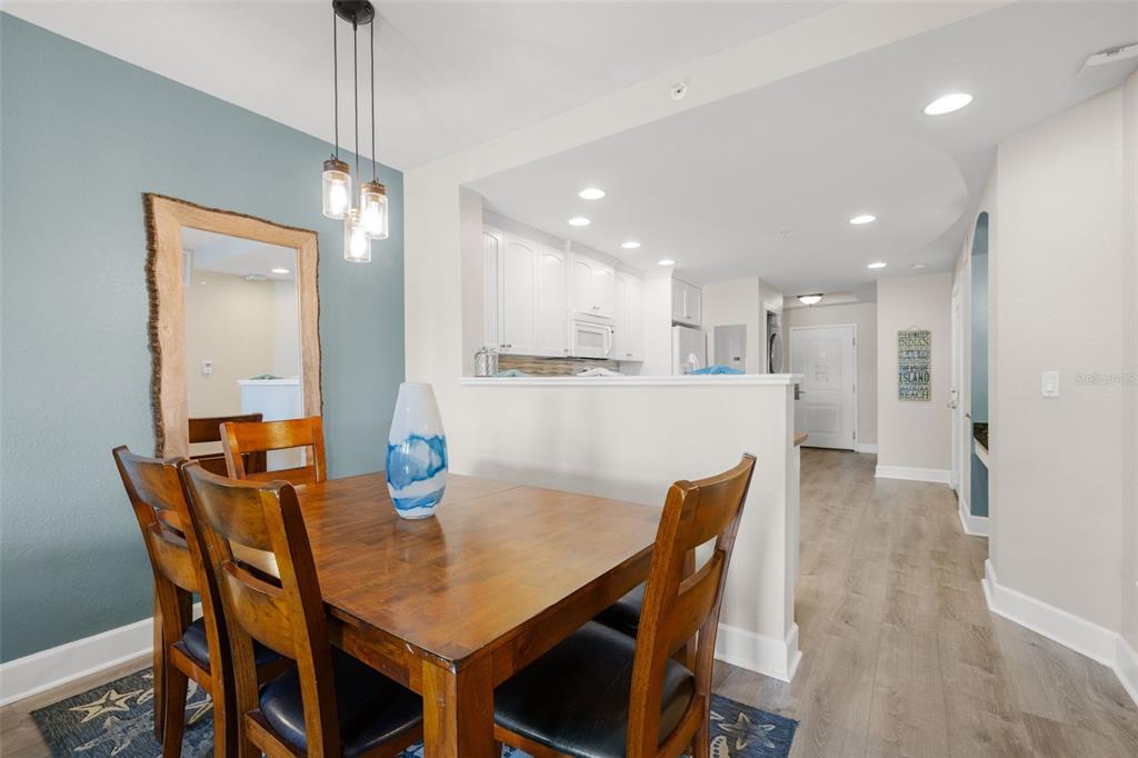 399 2nd Street, Unit 216 Indian Rocks Beach, FL 33785 - Photo 16 of 45 a view of a dining room and livingroom