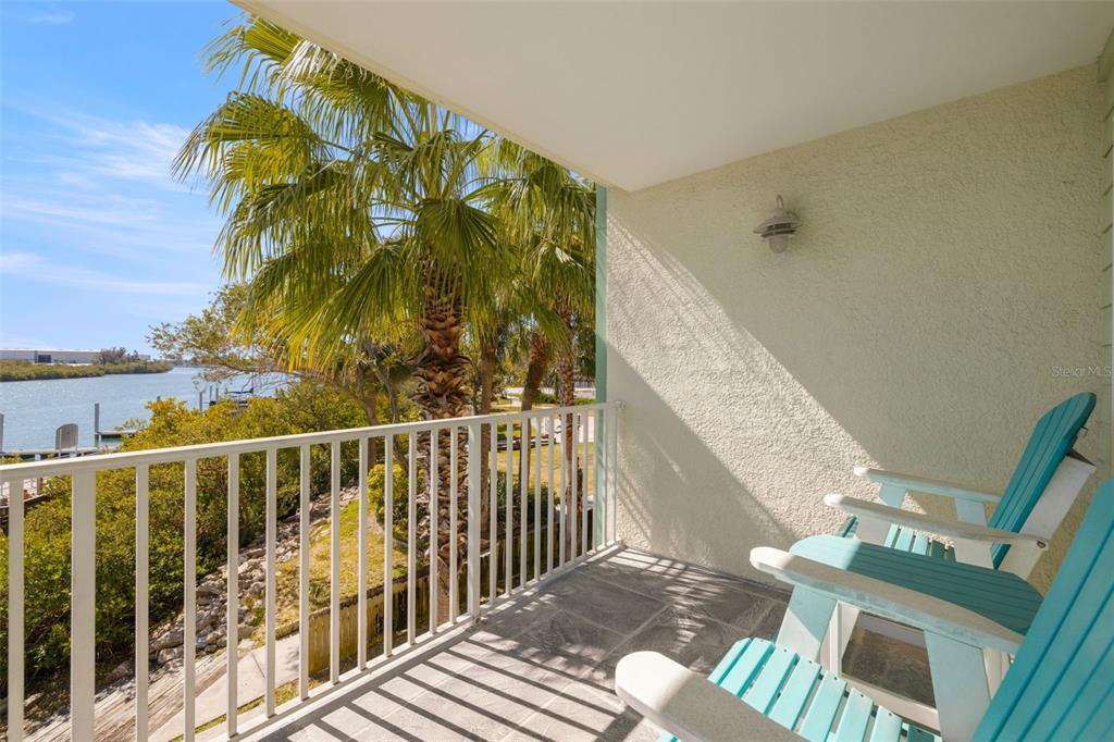 399 2nd Street, Unit 216 Indian Rocks Beach, FL 33785 - Photo 29 of 45 a view of balcony with wooden floor