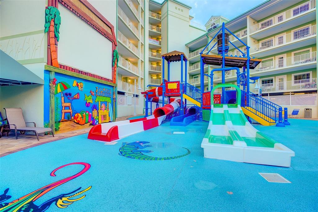 399 2nd Street, Unit 216 Indian Rocks Beach, FL 33785 - Photo 31 of 45 a view of an outdoor space back yard and front door