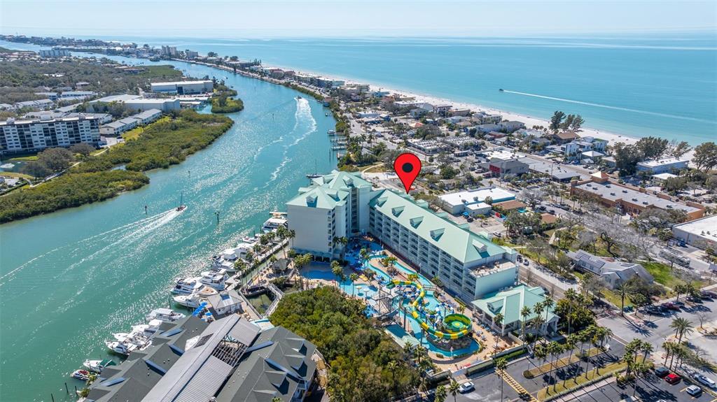 399 2nd Street, Unit 216 Indian Rocks Beach, FL 33785 - Photo 34 of 45 an aerial view of beach and residential houses with outdoor space