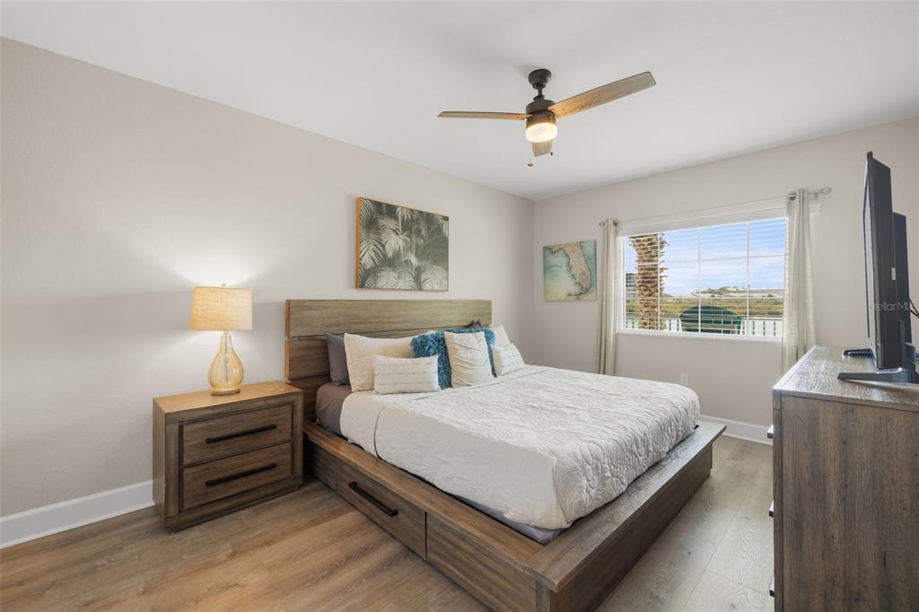 399 2nd Street, Unit 216 Indian Rocks Beach, FL 33785 - Photo 10 of 45 a bedroom with a bed and a window