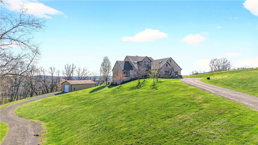 258 Evans Road Zelienople, PA 16063 - Photo 1 of 50 Welcome to your ultimate retreat... 258 Evans Road is waiting for you...