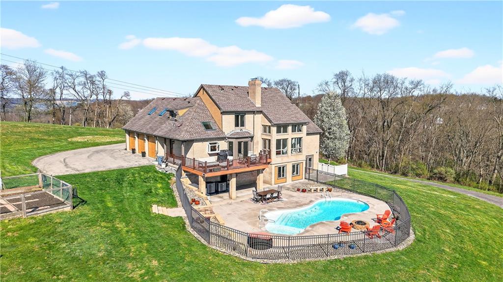 258 Evans Road Zelienople, PA 16063 - Photo 2 of 50 The sparkling, heated, saltwater pool & hot tub are amazing!!