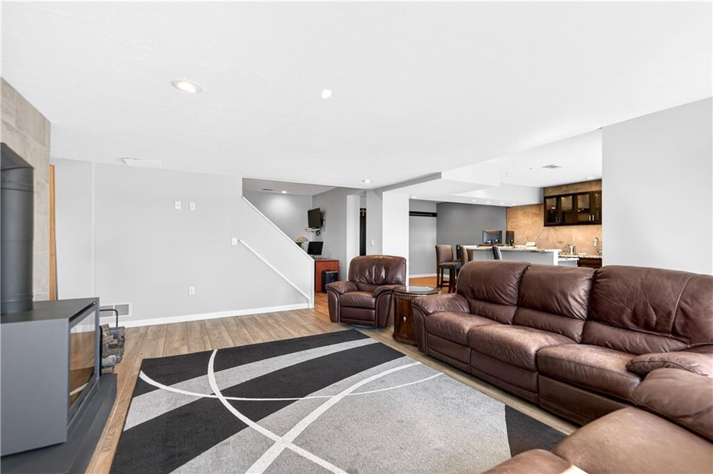 258 Evans Road Zelienople, PA 16063 - Photo 36 of 50 Lounge area with wood stove...