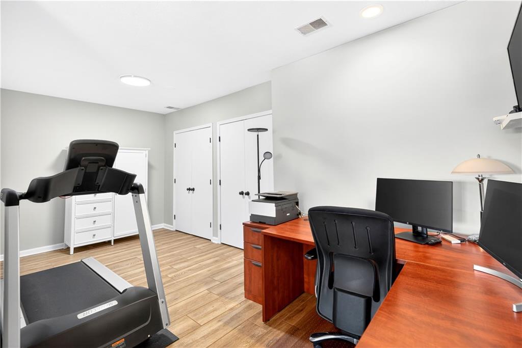 258 Evans Road Zelienople, PA 16063 - Photo 42 of 50 An office nook is tuck next to the stairs and there is tons of storage space down here too!!
