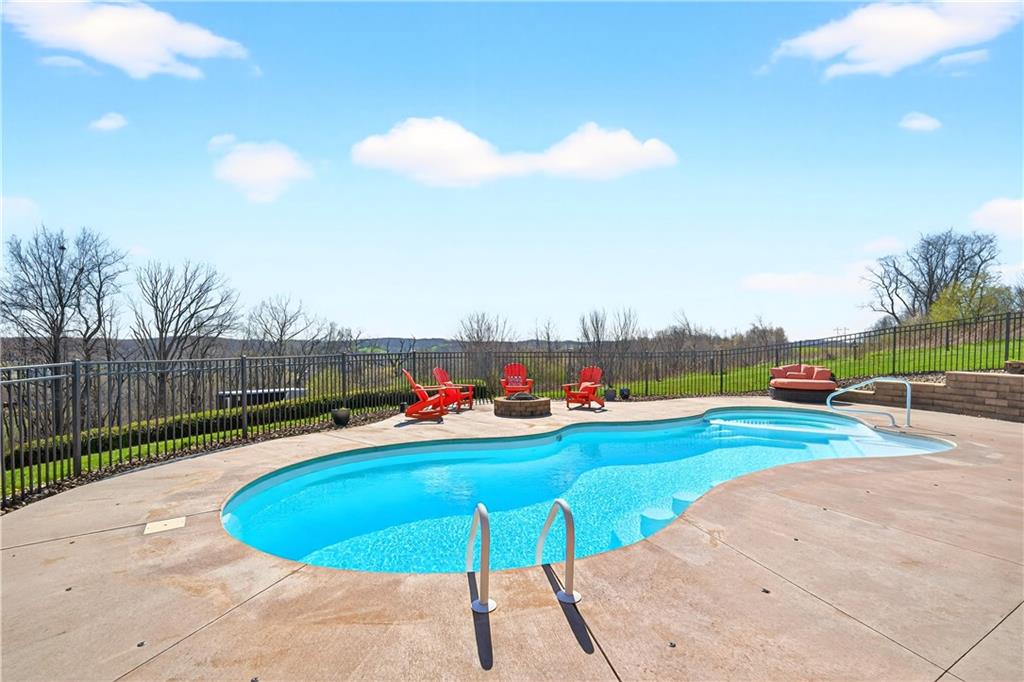258 Evans Road Zelienople, PA 16063 - Photo 45 of 50 No matter if you're in the pool, or sitting by the fire pit, the views are endless!!