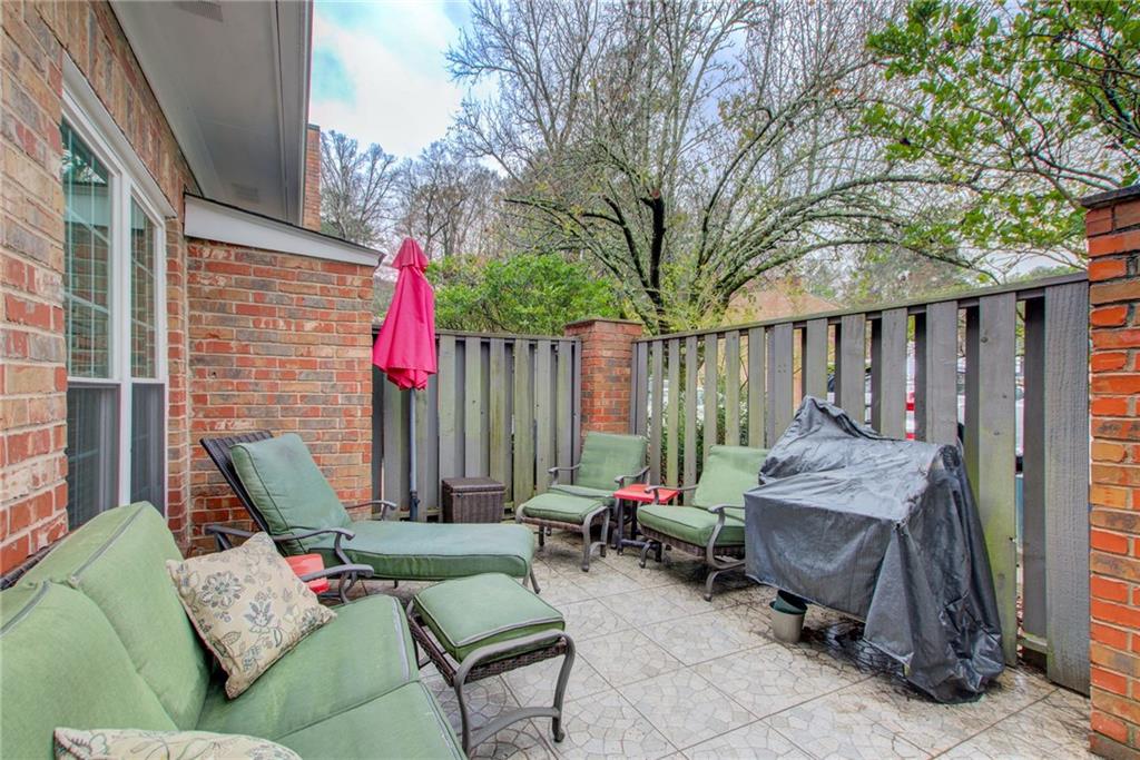 10 Market Square Place Northwest Atlanta, GA 30318 - Photo 16 of 36 a view of a patio with furniture and a fire pit