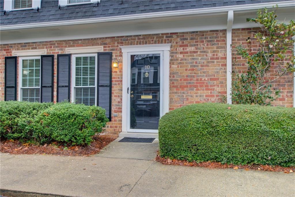 10 Market Square Place Northwest Atlanta, GA 30318 - Photo 36 of 36 front view of a house with a yard