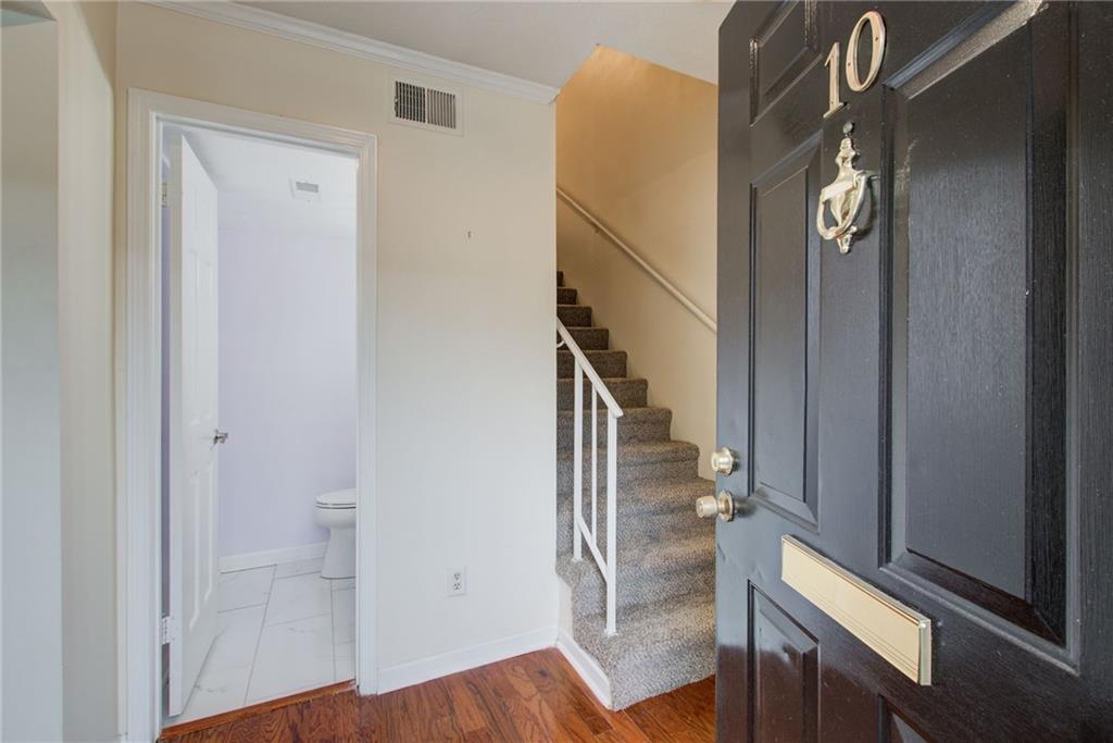 10 Market Square Place Northwest Atlanta, GA 30318 - Photo 4 of 36 a view of entryway with wooden floor