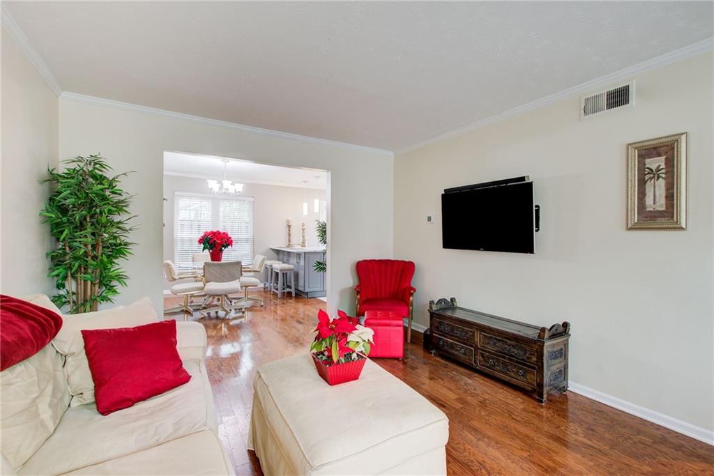 10 Market Square Place Northwest Atlanta, GA 30318 - Photo 6 of 36 a living room with furniture and a flat screen tv