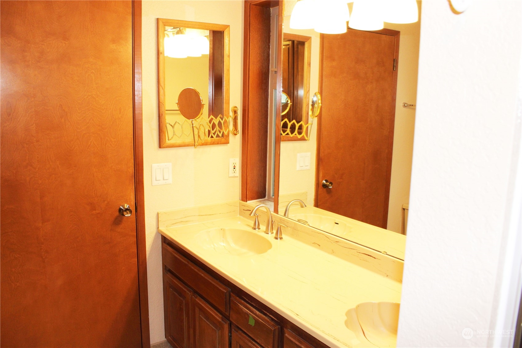 365 Dungeness Meadows Sequim, WA 98382 - Photo 12 of 28 a bathroom with a sink and a mirror